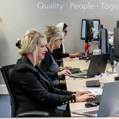 Woman sat infront of computer screen