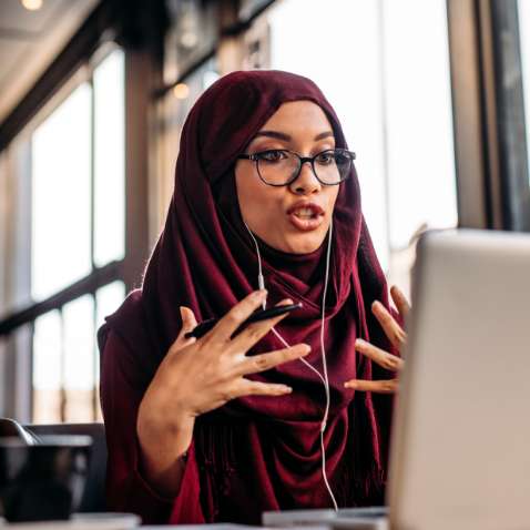 Woman sat infront of computer screen