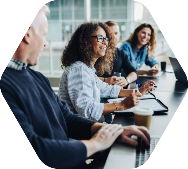 3 people looking at computer screen